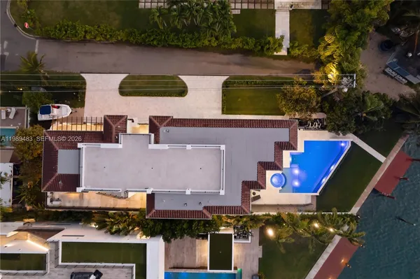 a view of swimming pool with seating space