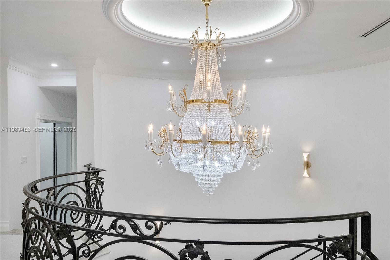 919 92nd Street Surfside, FL 33154 - Photo 4 of 74 a view of a chandelier and dining table in a room