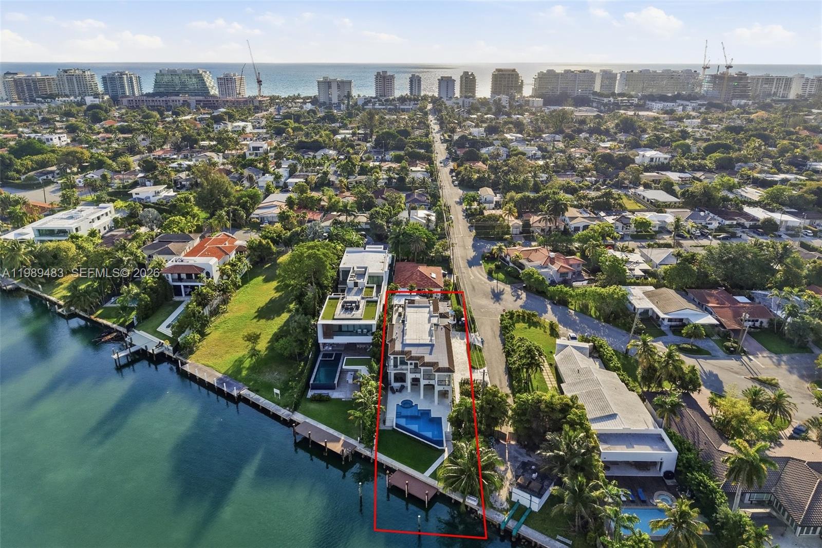 919 92nd Street Surfside, FL 33154 - Photo 68 of 74 an aerial view of a city with lots of residential buildings ocean and mountain view in back