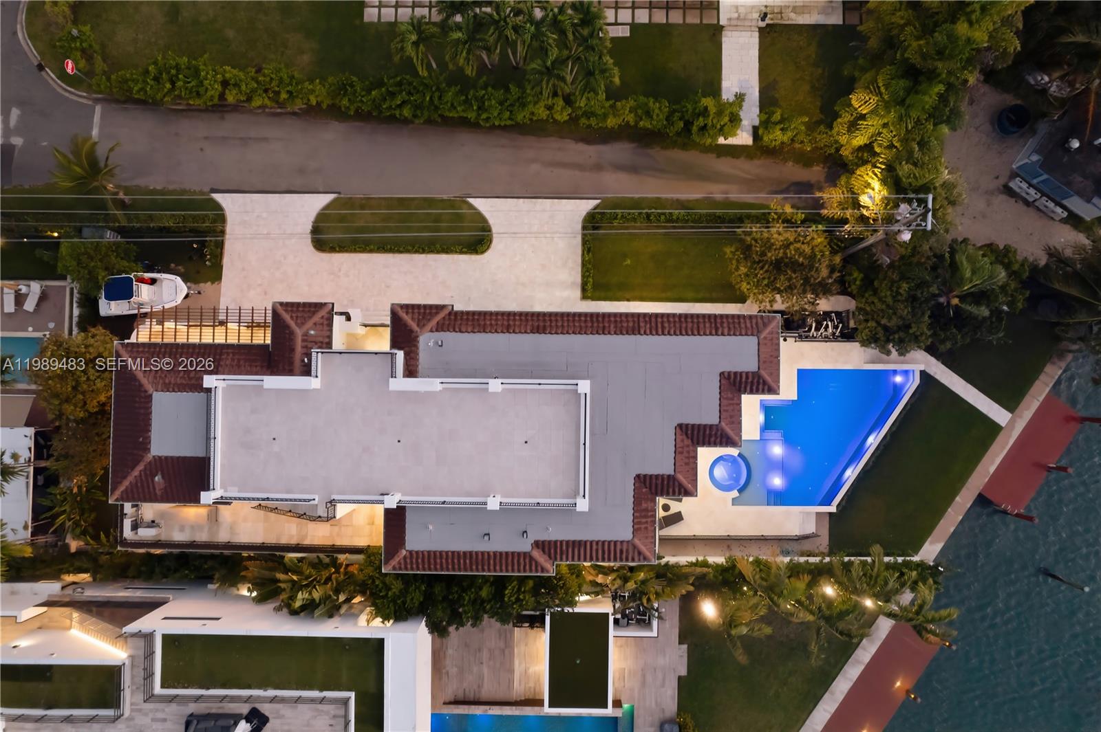 919 92nd Street Surfside, FL 33154 - Photo 8 of 74 an aerial view of residential houses with outdoor space