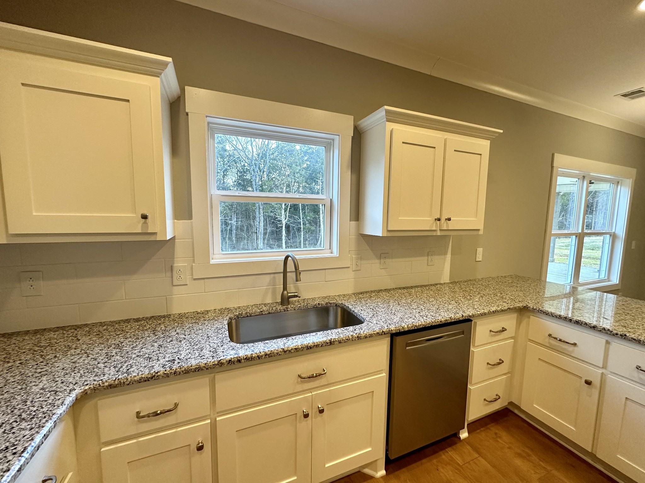 1212 White Rock Road Murfreesboro, TN 37129 - Photo 12 of 30 a kitchen with granite countertop cabinets stainless steel appliances a sink and a window