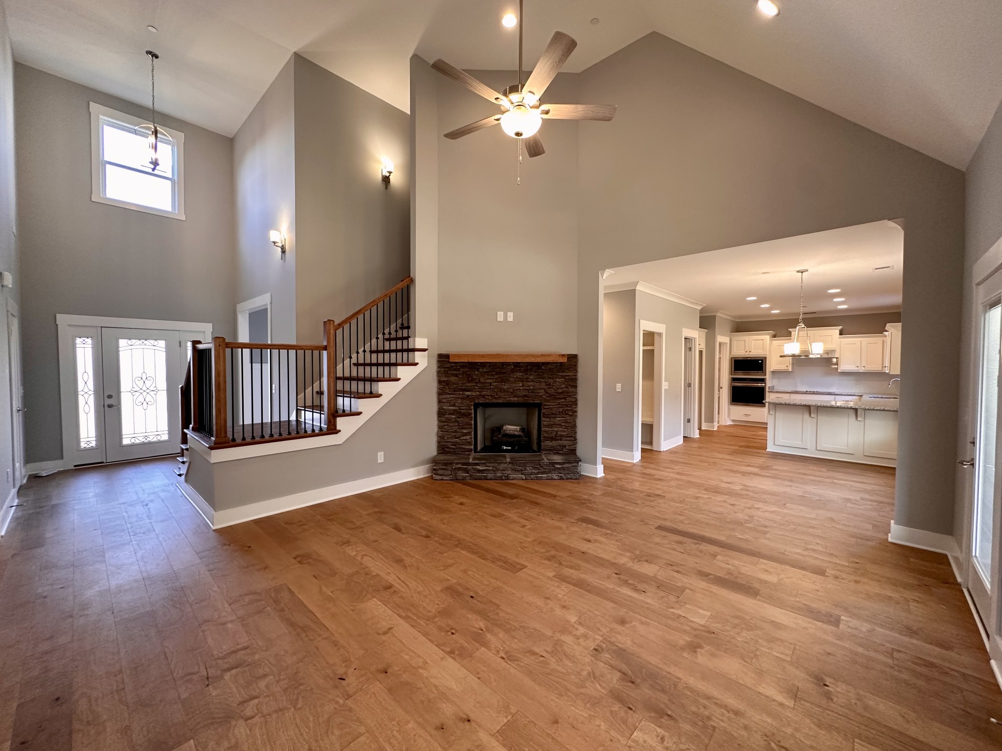 1212 White Rock Road Murfreesboro, TN 37129 - Photo 5 of 30 a view of an empty room with a fireplace and a window