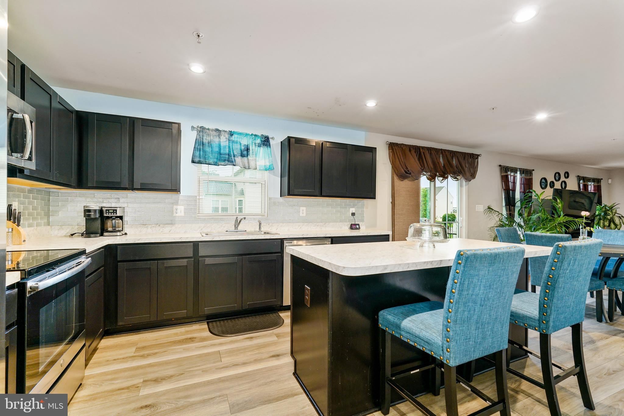 2 Ridgely Forest Drive Elkton, MD 21921 - Photo 18 of 54 a kitchen with a sink and cabinets