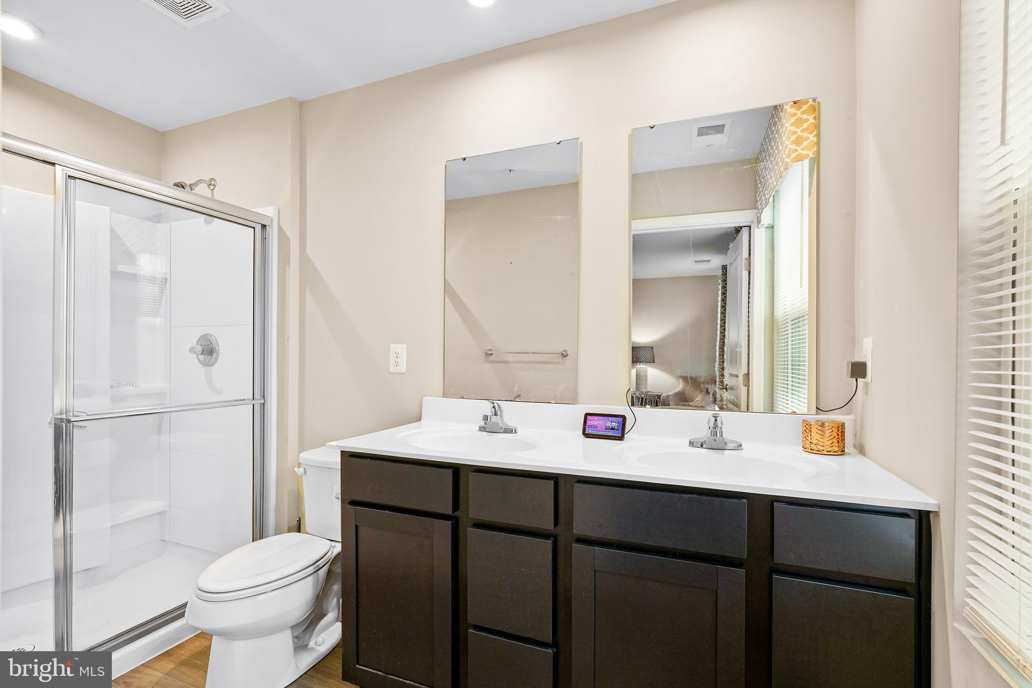 2 Ridgely Forest Drive Elkton, MD 21921 - Photo 22 of 54 a bathroom with a sink toilet vanity and shower