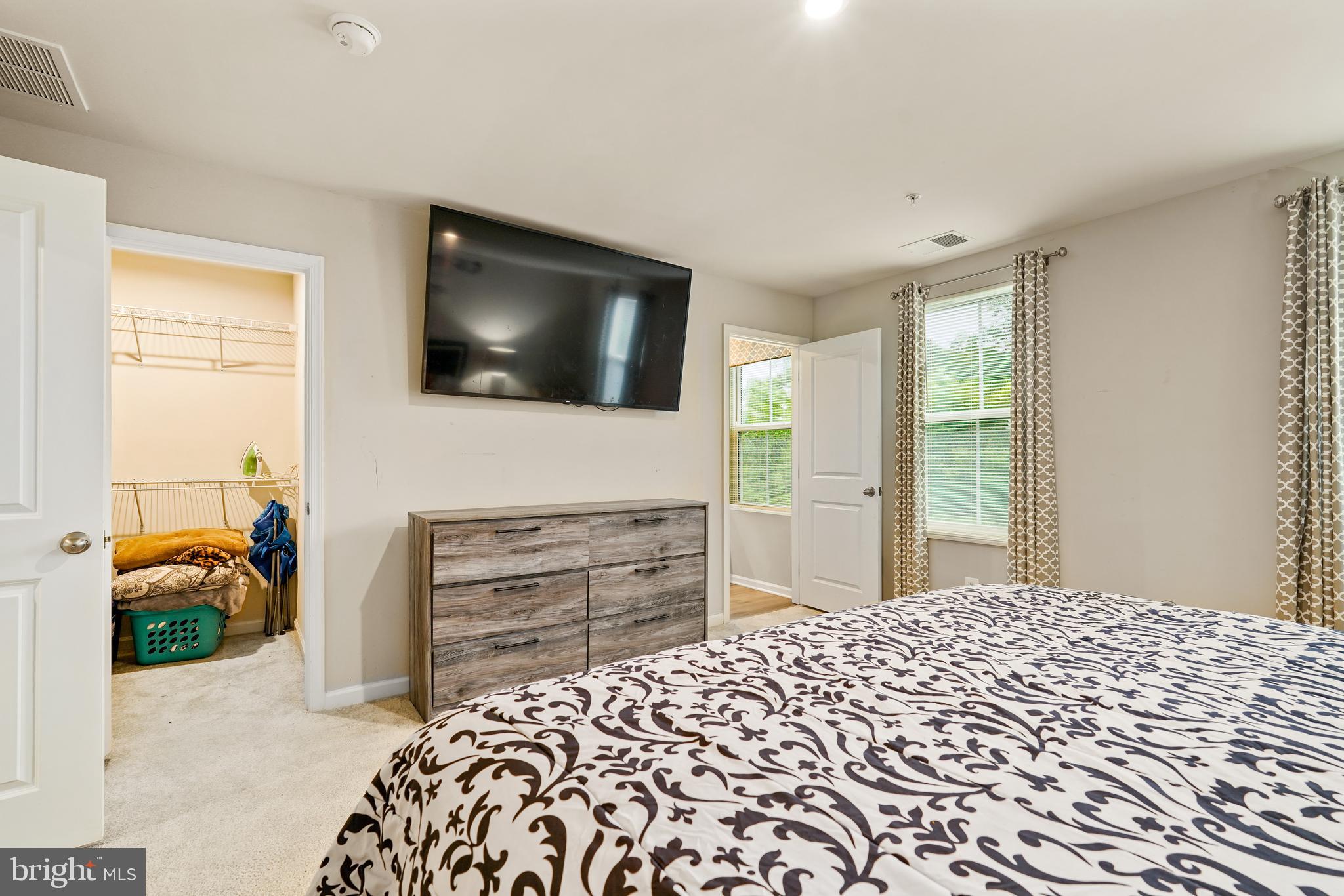 2 Ridgely Forest Drive Elkton, MD 21921 - Photo 23 of 54 a bedroom with a bed and a flat screen tv