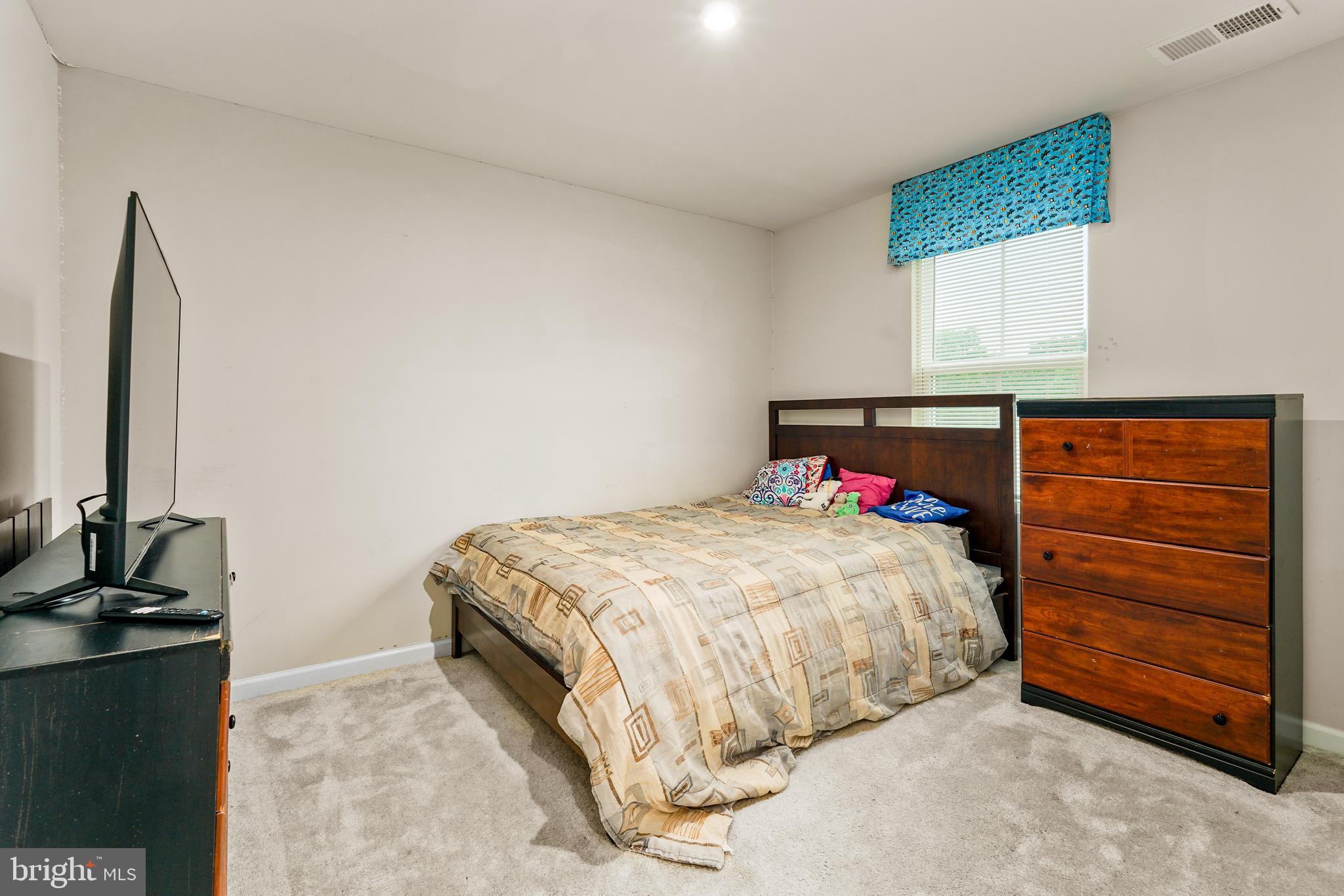 2 Ridgely Forest Drive Elkton, MD 21921 - Photo 26 of 54 a bedroom with a bed and a window