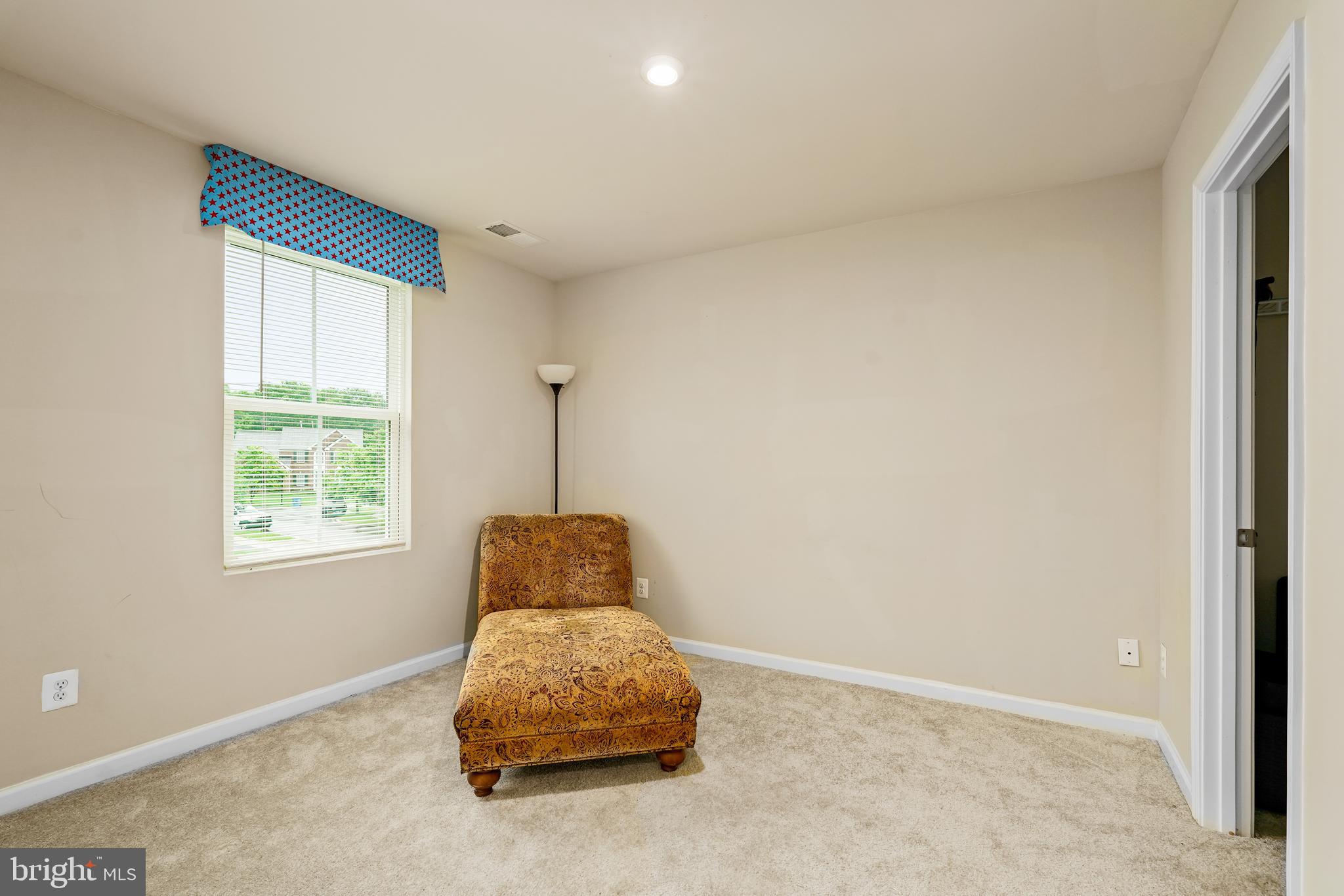 2 Ridgely Forest Drive Elkton, MD 21921 - Photo 30 of 54 a room with a window and a chandelier