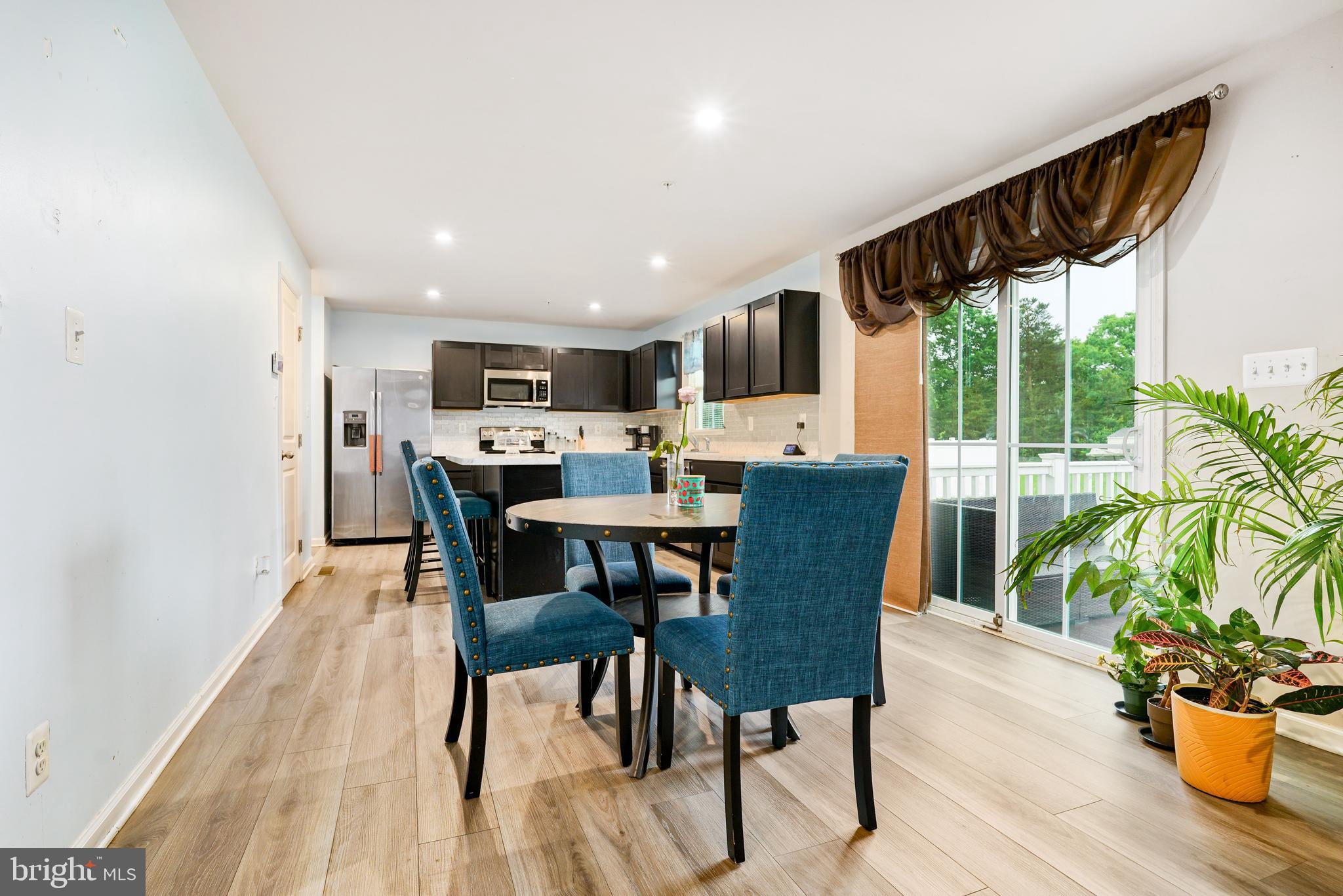 2 Ridgely Forest Drive Elkton, MD 21921 - Photo 5 of 54 a view of a dining room with furniture window and wooden floor