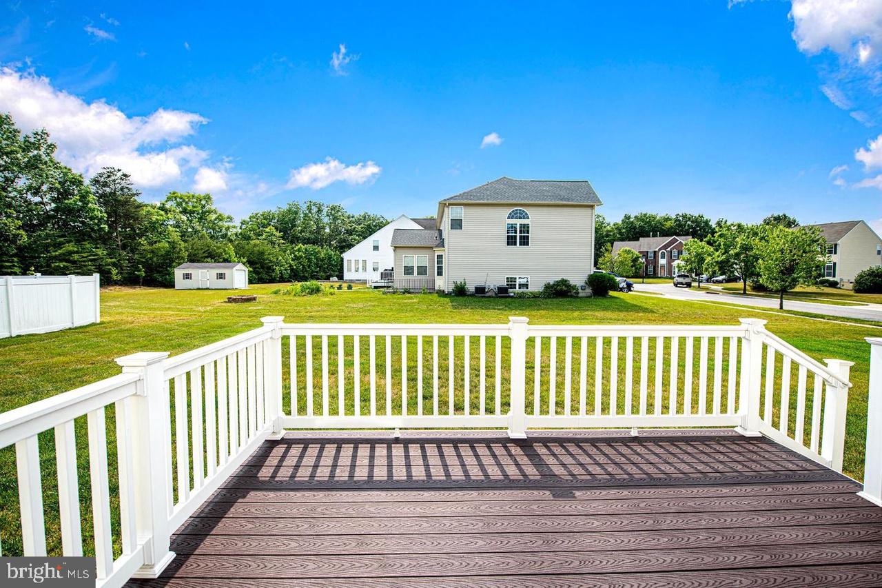 2 Ridgely Forest Drive Elkton, MD 21921 - Photo 6 of 54 a view of a wooden deck and a yard