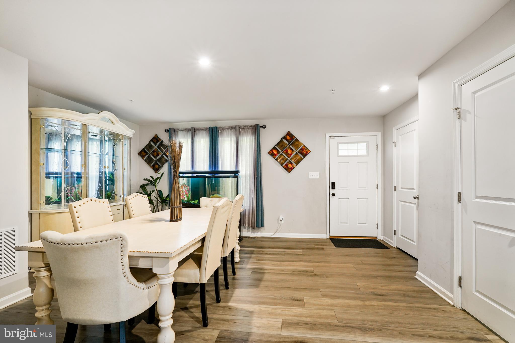 2 Ridgely Forest Drive Elkton, MD 21921 - Photo 9 of 54 a view of a dining room with furniture window and wooden floor