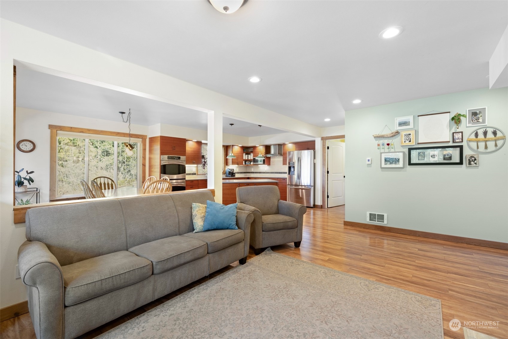 3956 Happy Valley Road Sequim, WA 98382 - Photo 11 of 40 a living room with furniture and a large window