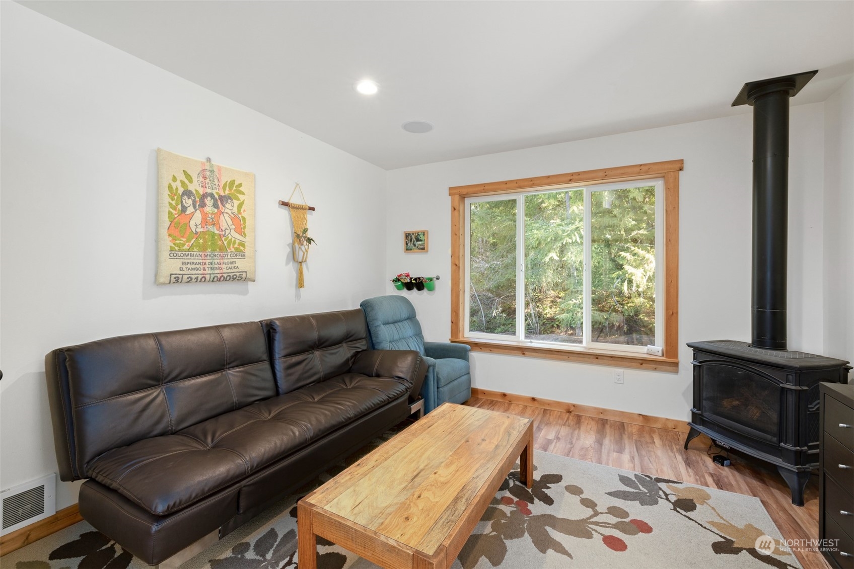 3956 Happy Valley Road Sequim, WA 98382 - Photo 22 of 40 a living room with furniture and a flat screen tv