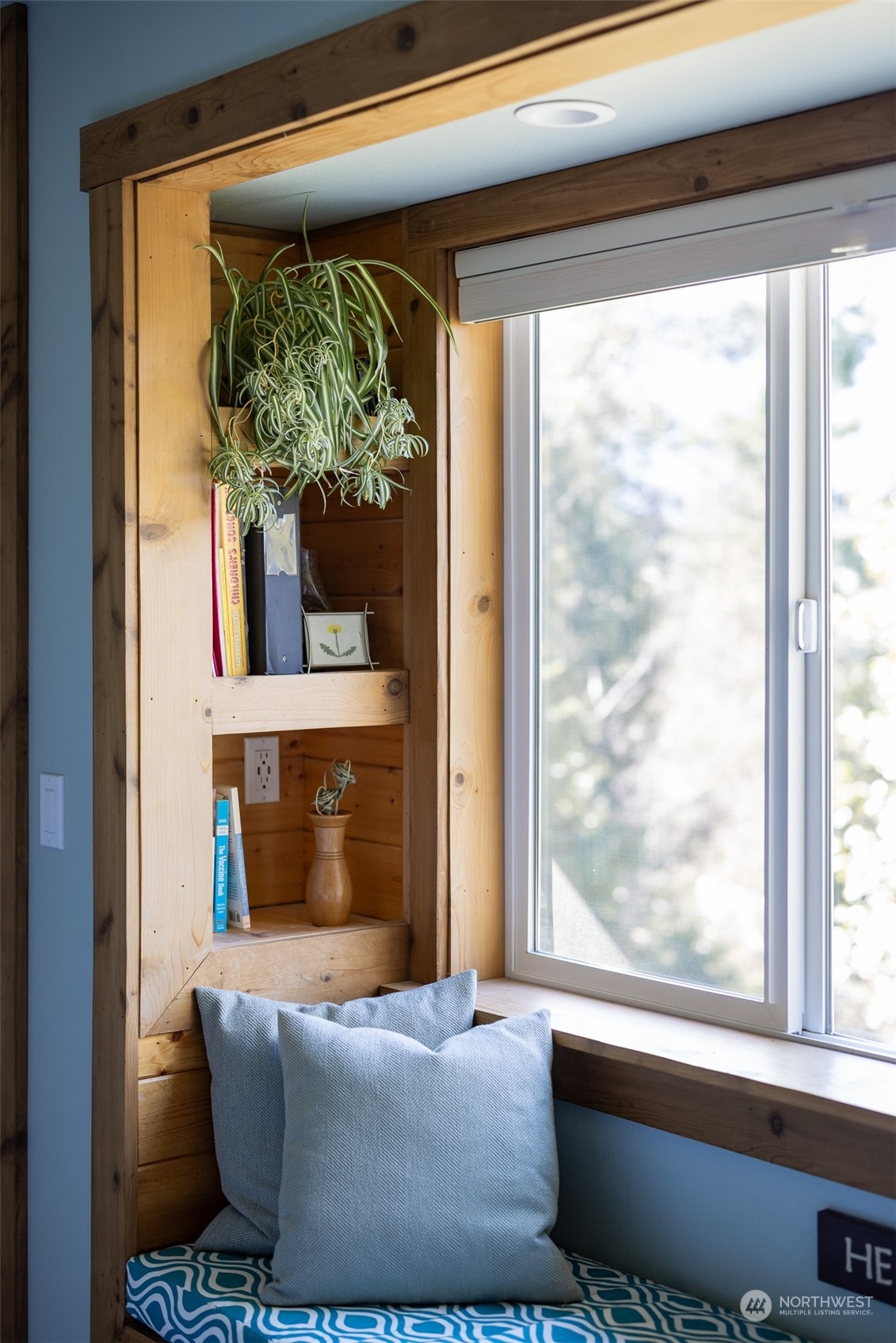 3956 Happy Valley Road Sequim, WA 98382 - Photo 26 of 40 a living room with a large window and a table