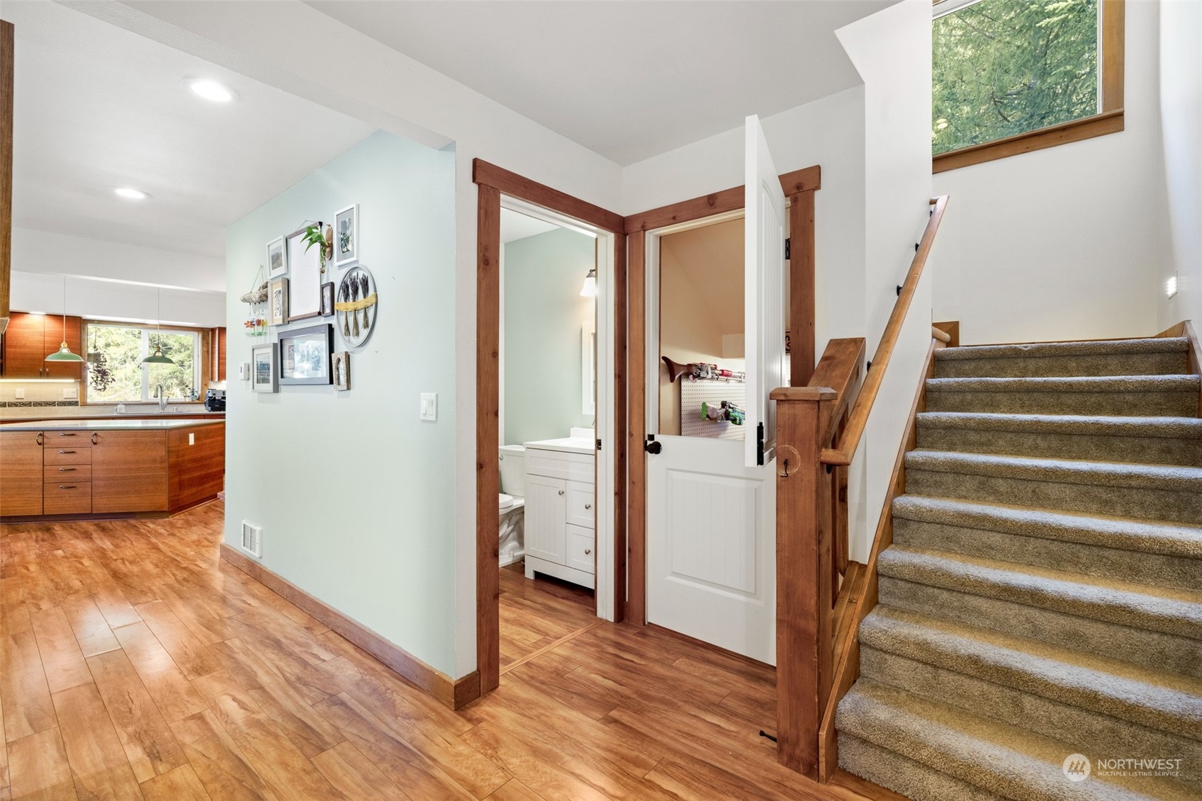 3956 Happy Valley Road Sequim, WA 98382 - Photo 27 of 40 a view of a kitchen with wooden floor and a kitchen