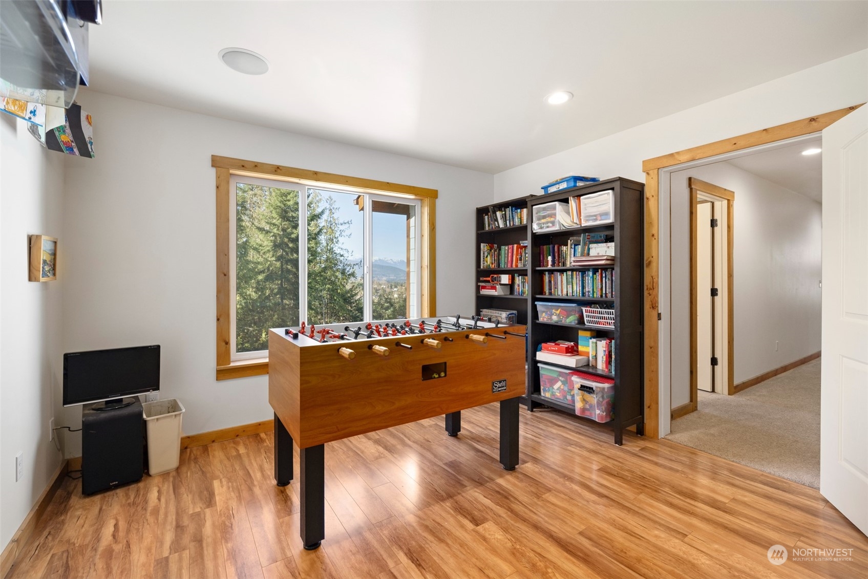 3956 Happy Valley Road Sequim, WA 98382 - Photo 28 of 40 a living room with furniture a rug and a large window