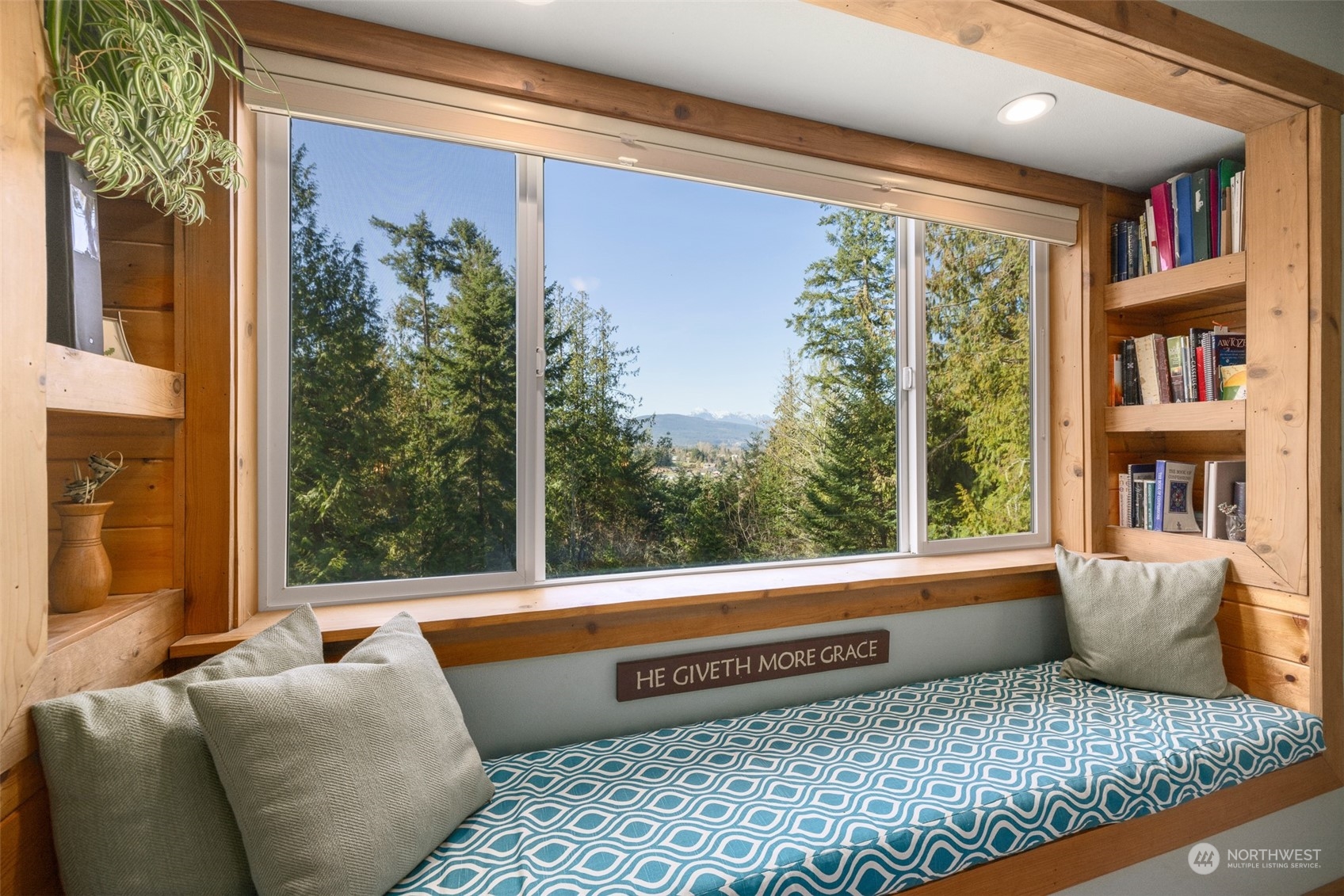 3956 Happy Valley Road Sequim, WA 98382 - Photo 30 of 40 a living room with furniture and a large window