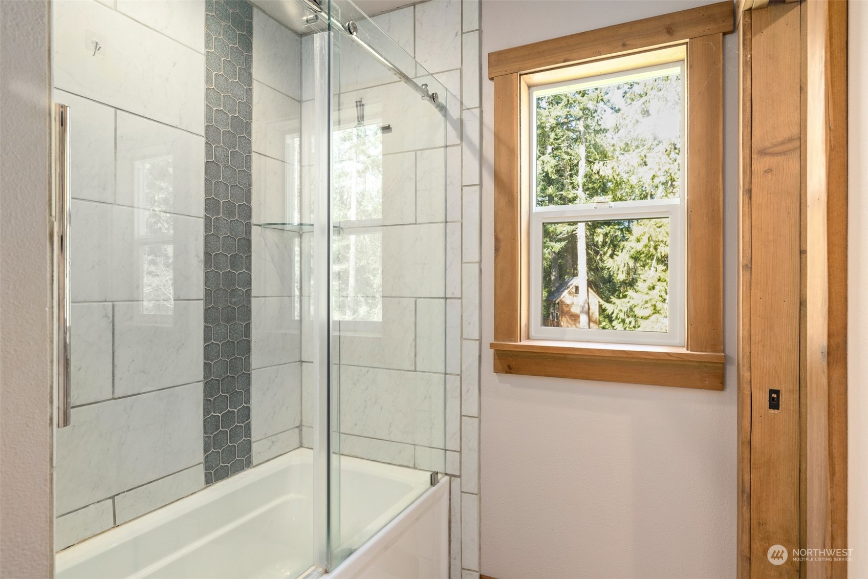 3956 Happy Valley Road Sequim, WA 98382 - Photo 32 of 40 a bathroom with a bathtub and shower