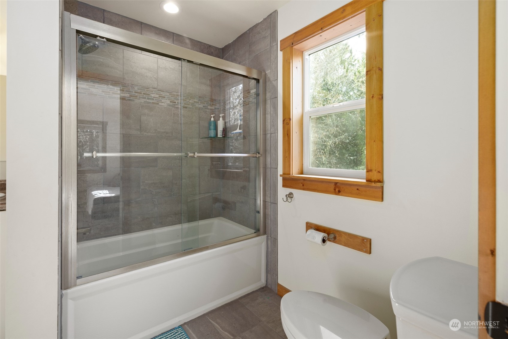 3956 Happy Valley Road Sequim, WA 98382 - Photo 34 of 40 a bath room with a bath tub and a shower