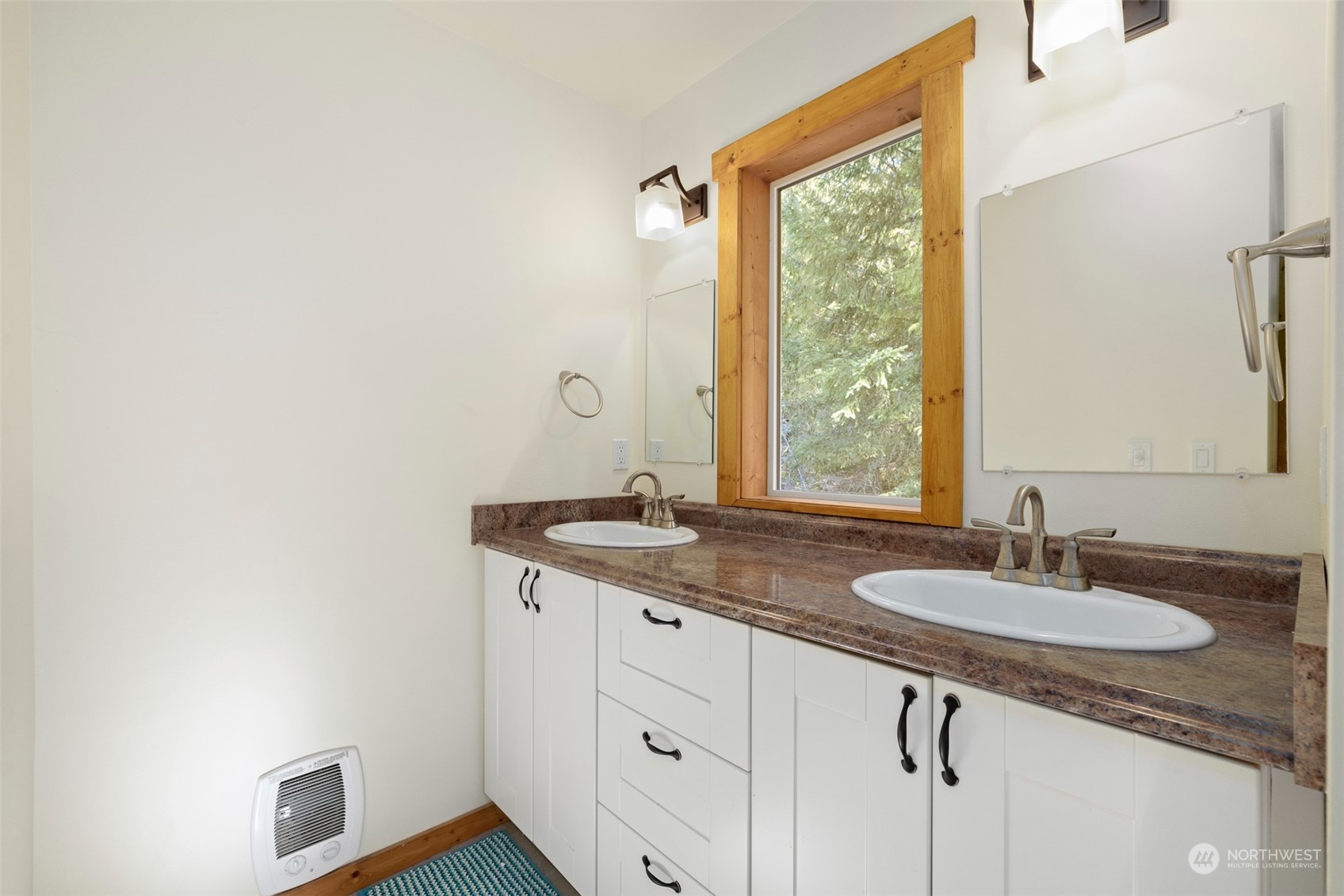 3956 Happy Valley Road Sequim, WA 98382 - Photo 38 of 40 a bathroom with a granite countertop sink and a mirror