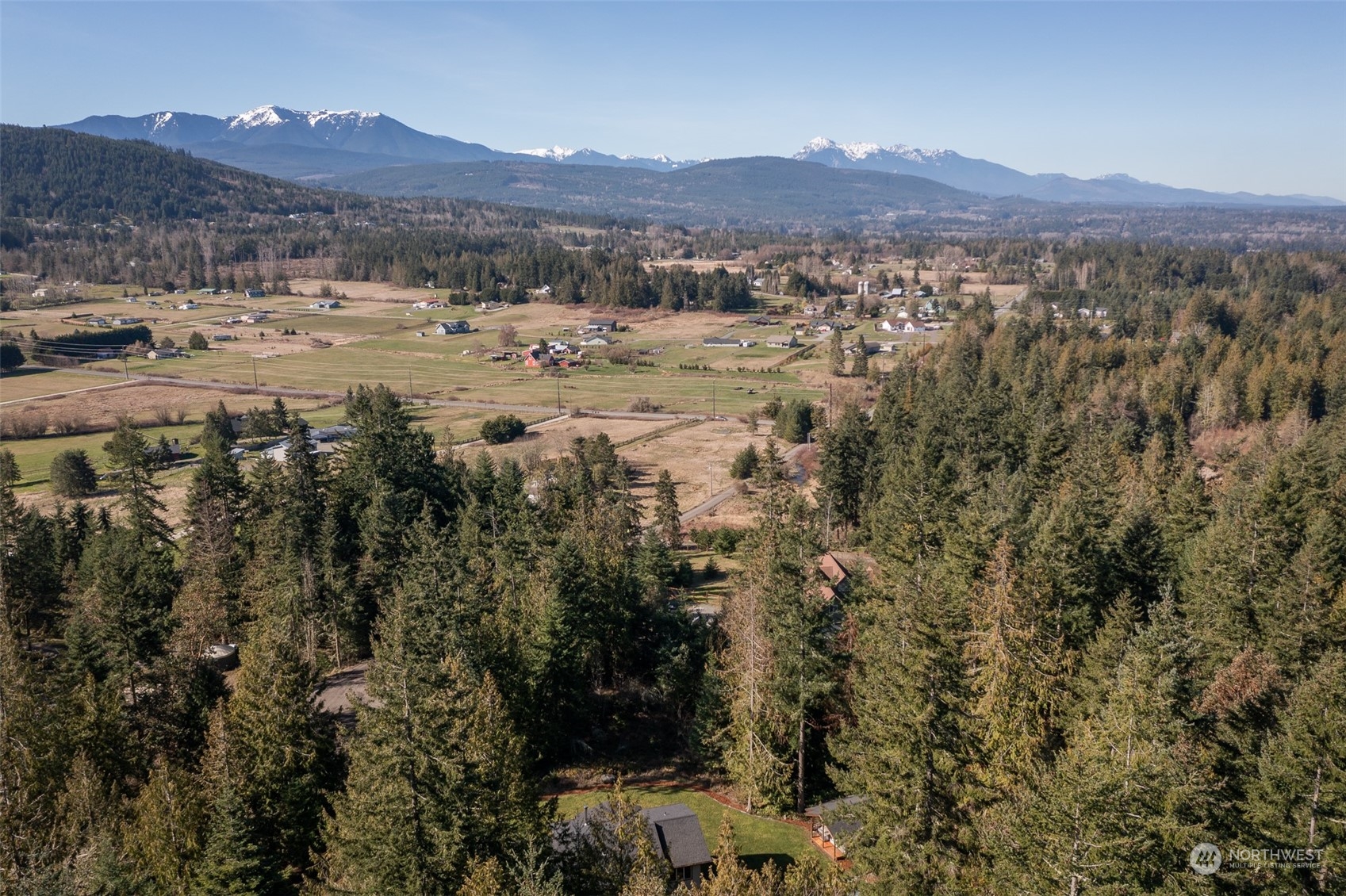 3956 Happy Valley Road Sequim, WA 98382 - Photo 5 of 40 a view of a mountain with an outdoor space and seating