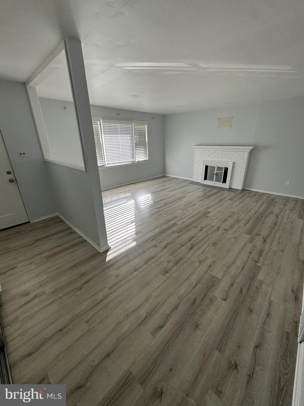 7410 Dickenson Street Springfield, VA 22150 - Photo 2 of 14 Spacious living area with natural light.