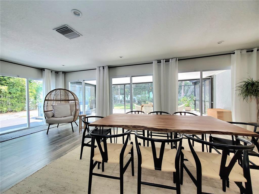 6522 Hidden Beach Circle Orlando, FL 32819 - Photo 23 of 65 a view of a dining room with furniture window and outside view