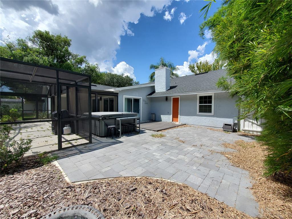 6522 Hidden Beach Circle Orlando, FL 32819 - Photo 58 of 65 a view of a house with a patio