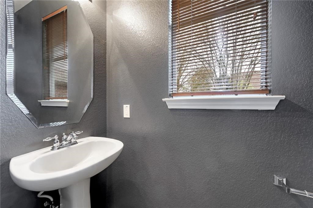 932 Rusk Road Round Rock, TX 78665 - Photo 20 of 33 main floor half-bathroom.