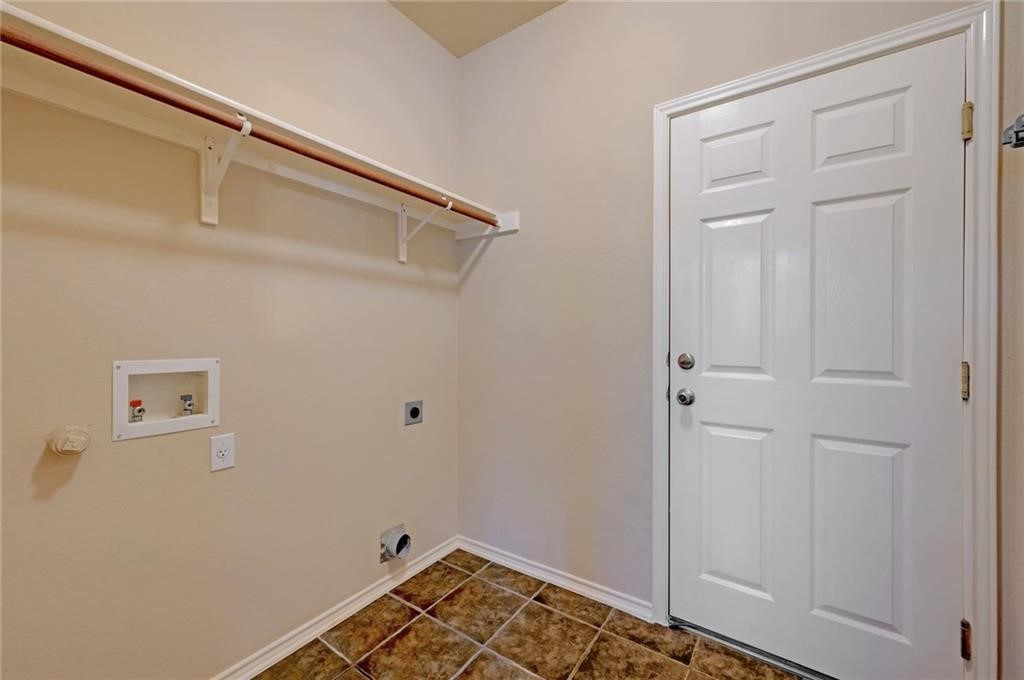 932 Rusk Road Round Rock, TX 78665 - Photo 21 of 33 main floor laundry.