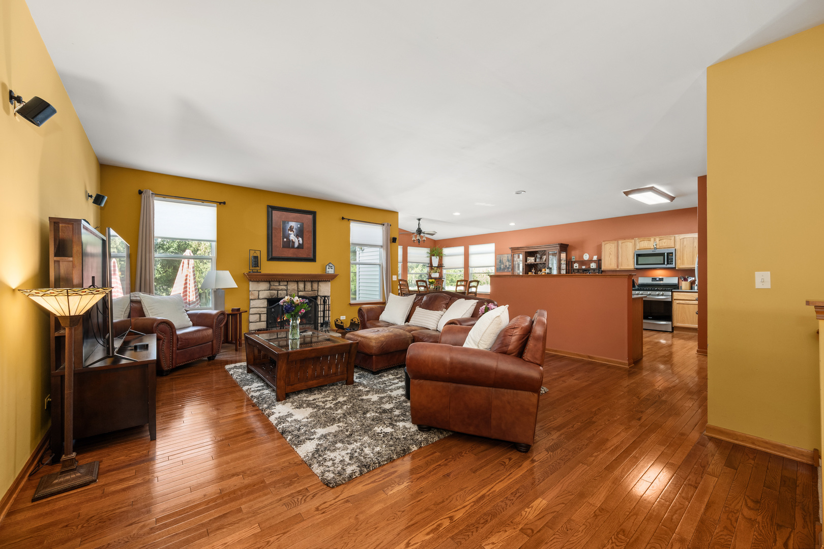 214 Stearn Drive Genoa, IL 60135 - Photo 12 of 24 a living room with furniture and a wooden floor