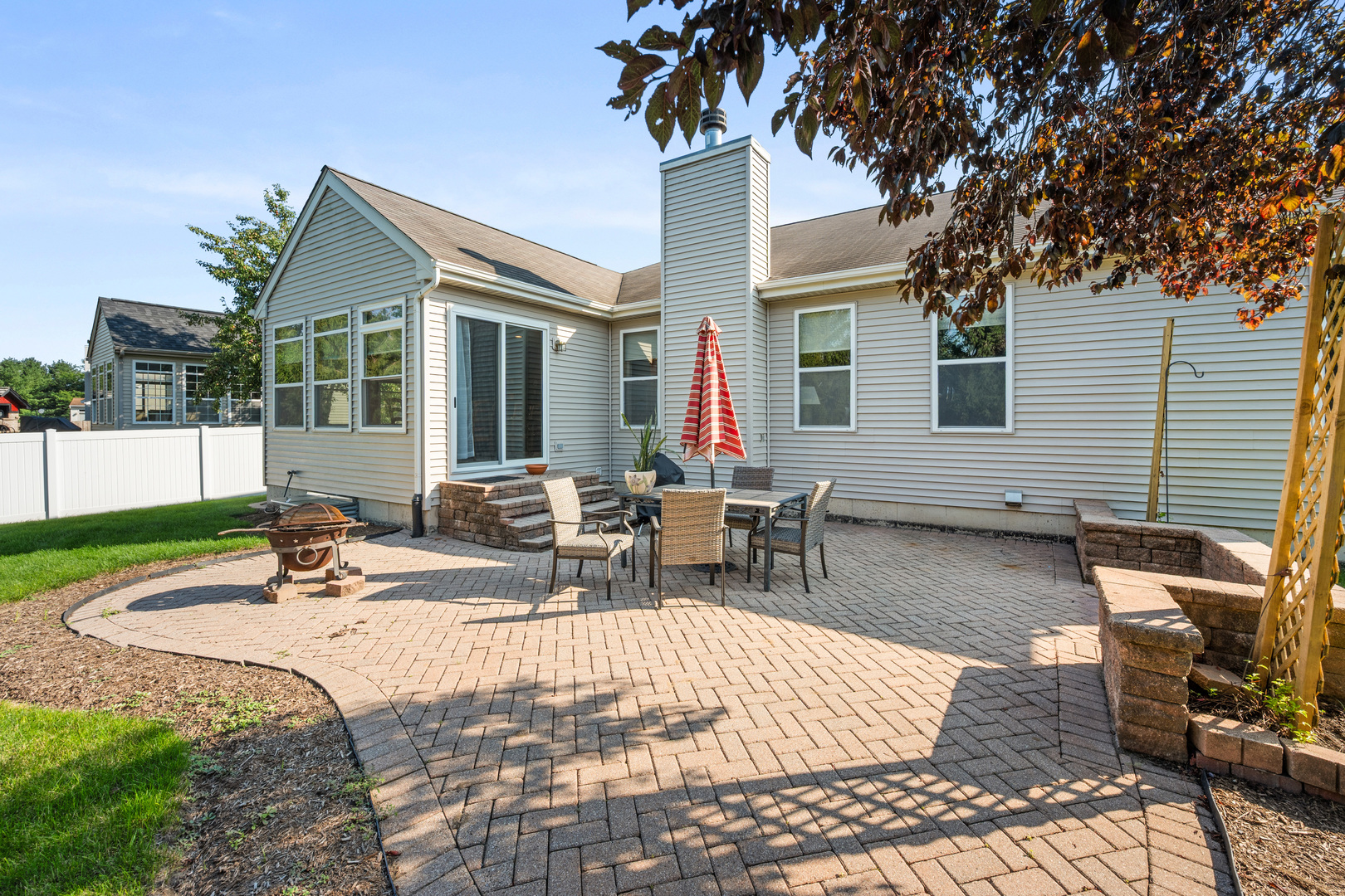 214 Stearn Drive Genoa, IL 60135 - Photo 24 of 24 a view of a house with backyard and sitting area