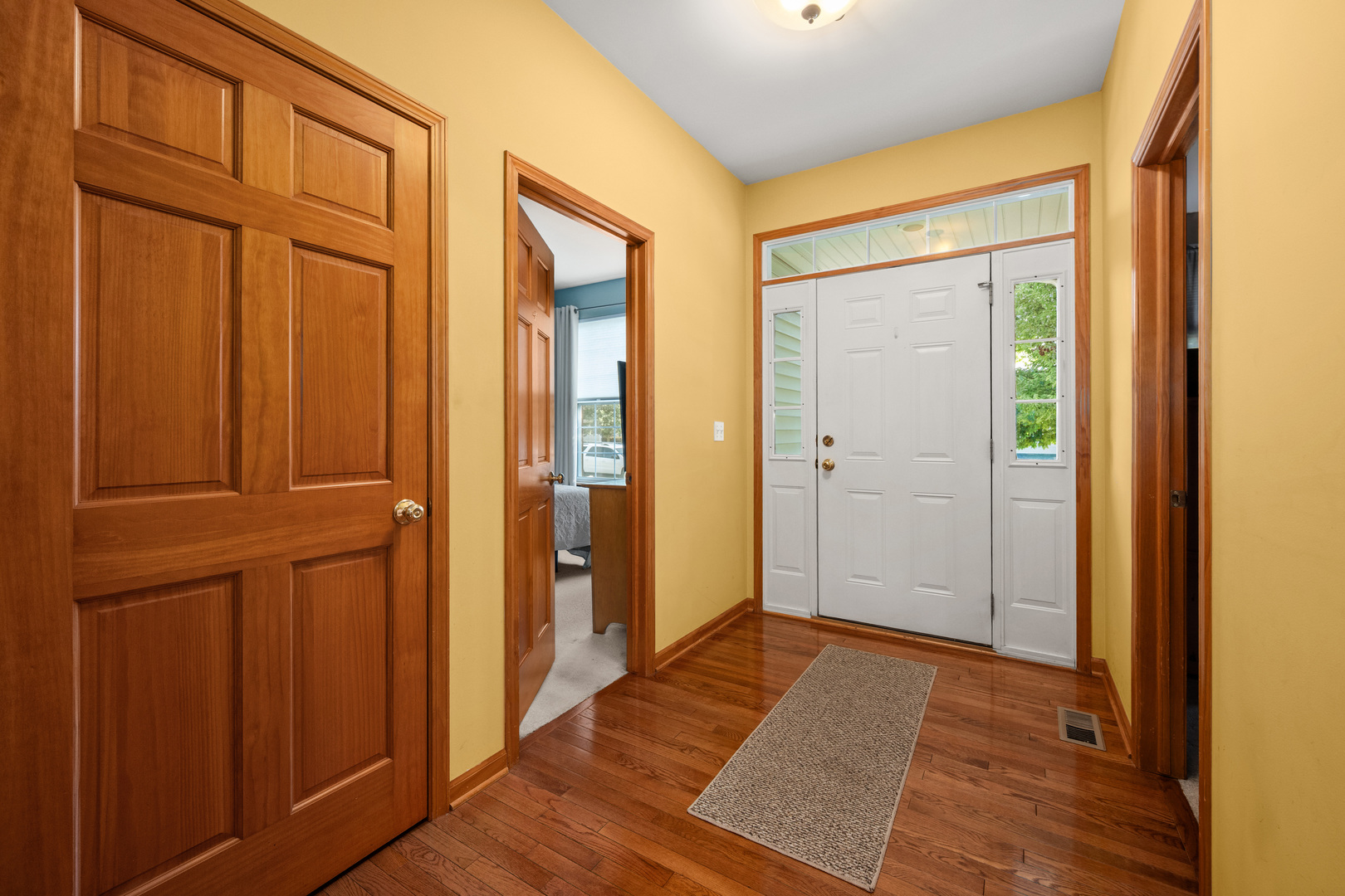 214 Stearn Drive Genoa, IL 60135 - Photo 4 of 24 wooden floor and windows in a room