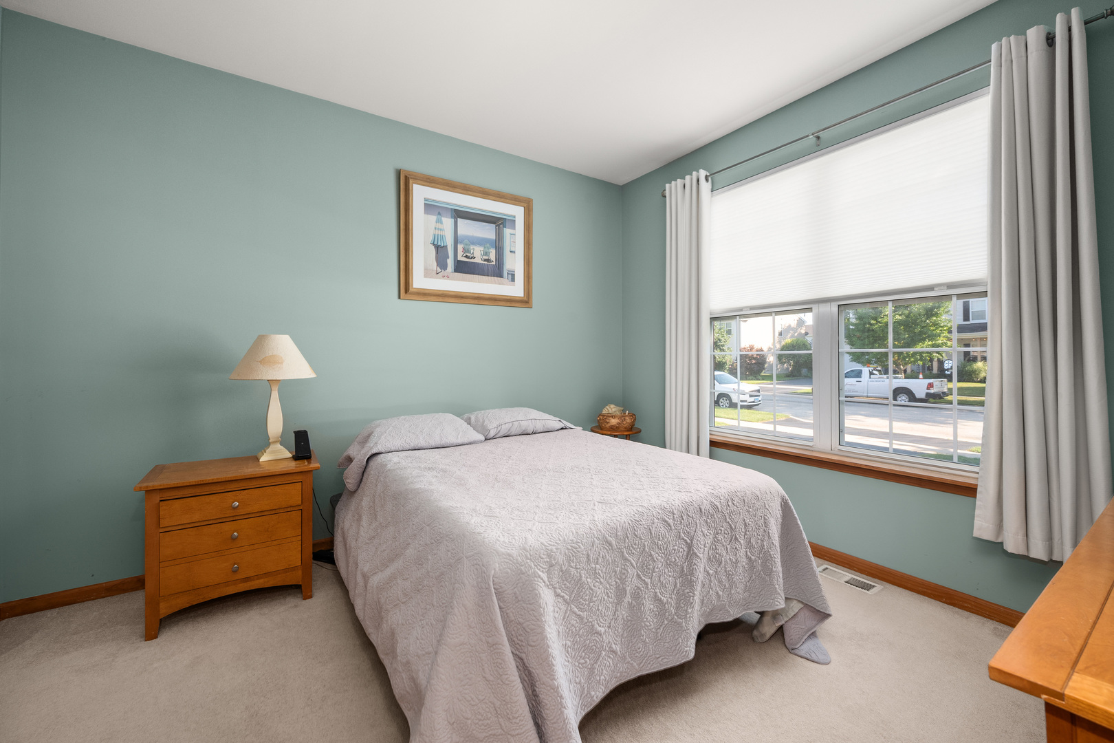 214 Stearn Drive Genoa, IL 60135 - Photo 6 of 24 a bedroom with a bed and a window