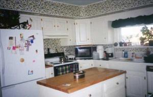 2 Fairgrounds Road Gilbert, PA 18331 - Photo 3 of 6 a kitchen with stainless steel appliances granite countertop a sink a stove and a refrigerator