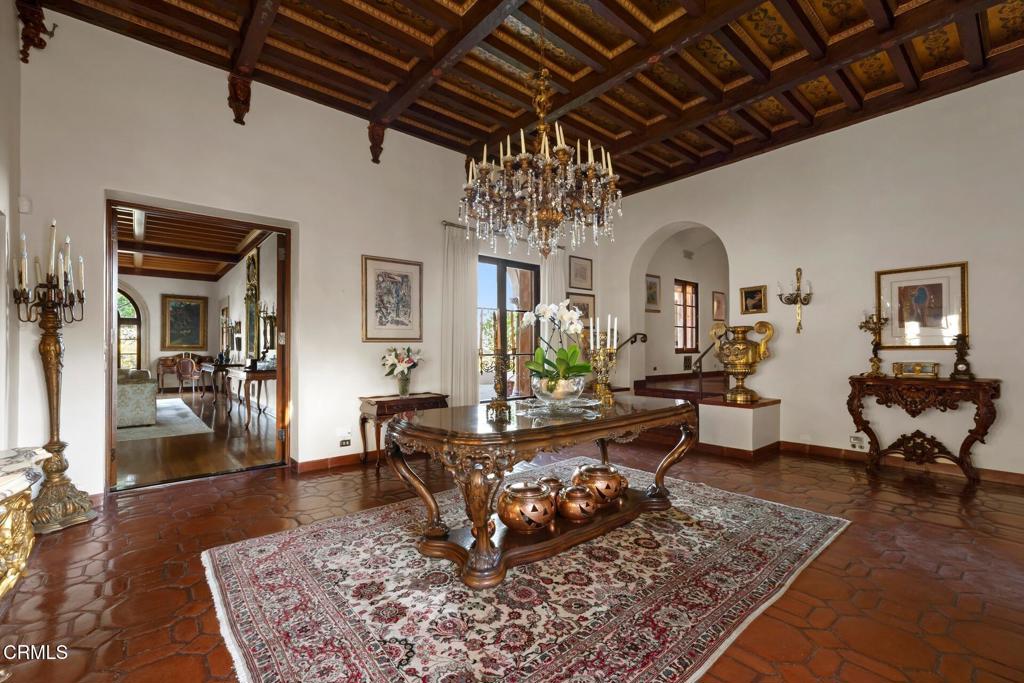 262 South San Rafael Avenue Pasadena, CA 91105 - Photo 11 of 49 a living room with furniture and a chandelier