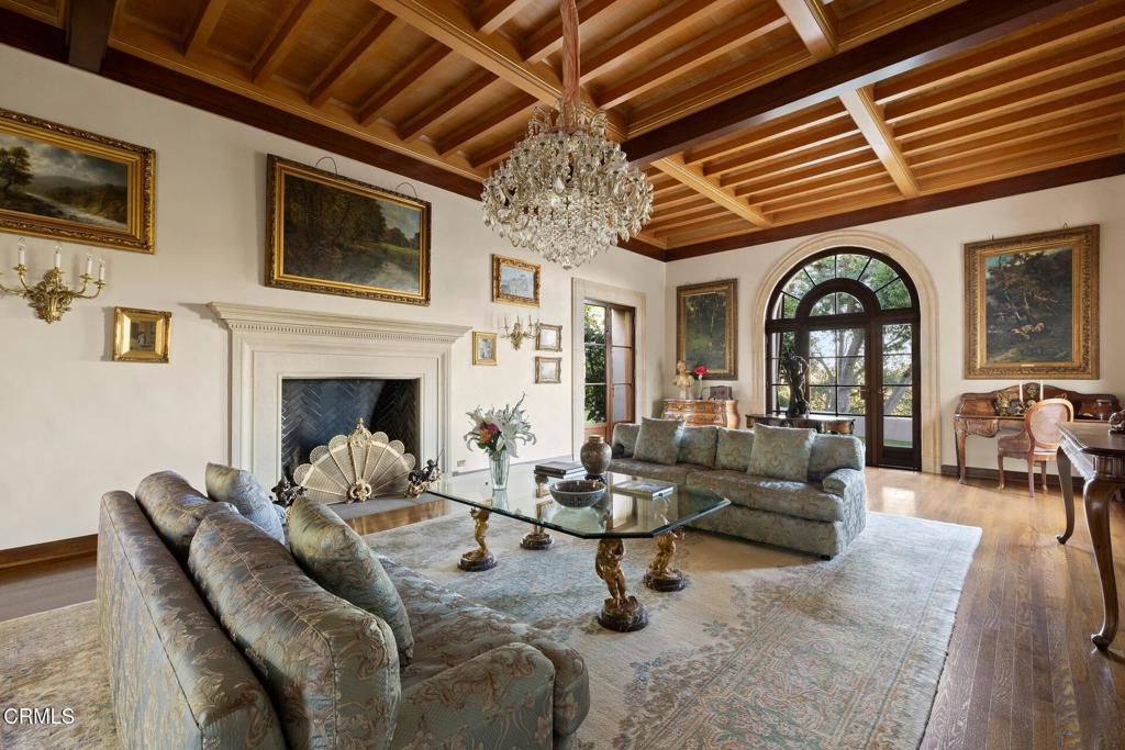 262 South San Rafael Avenue Pasadena, CA 91105 - Photo 13 of 49 a living room with furniture fireplace and flat screen tv