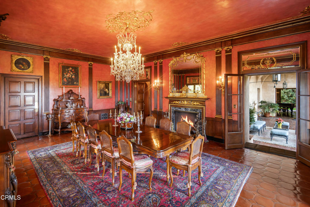 262 South San Rafael Avenue Pasadena, CA 91105 - Photo 24 of 49 a view of a dining room with furniture and chandelier