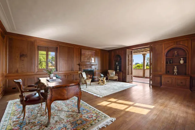 a room with furniture and wooden floor