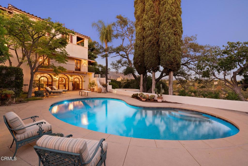 262 South San Rafael Avenue Pasadena, CA 91105 - Photo 42 of 49 a view of a swimming pool with sitting area