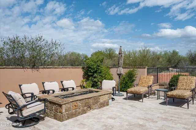 a view of a terrace with sitting area