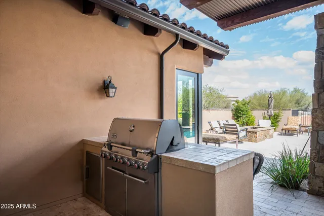 a view of open kitchen with a sink and dishwasher a stove top oven