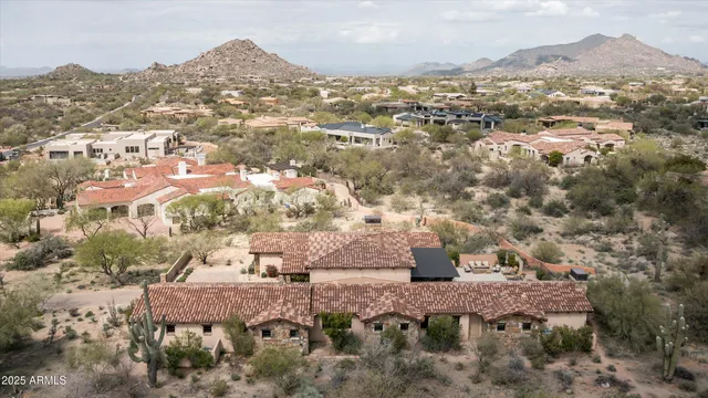 a view of a house with roof deck front of house