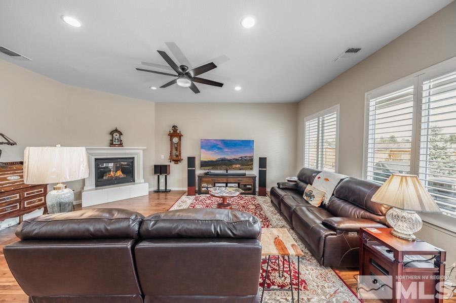 950 Broderick Trail Reno, NV 89523 - Photo 19 of 39 a living room with furniture and a fireplace