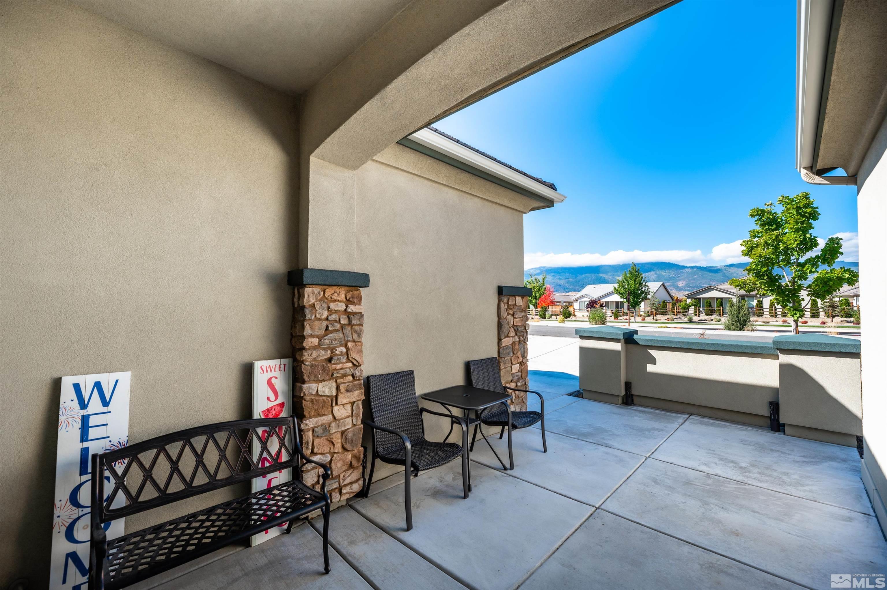 950 Broderick Trail Reno, NV 89523 - Photo 5 of 39 a view of a chairs and tables in the back yard of the house