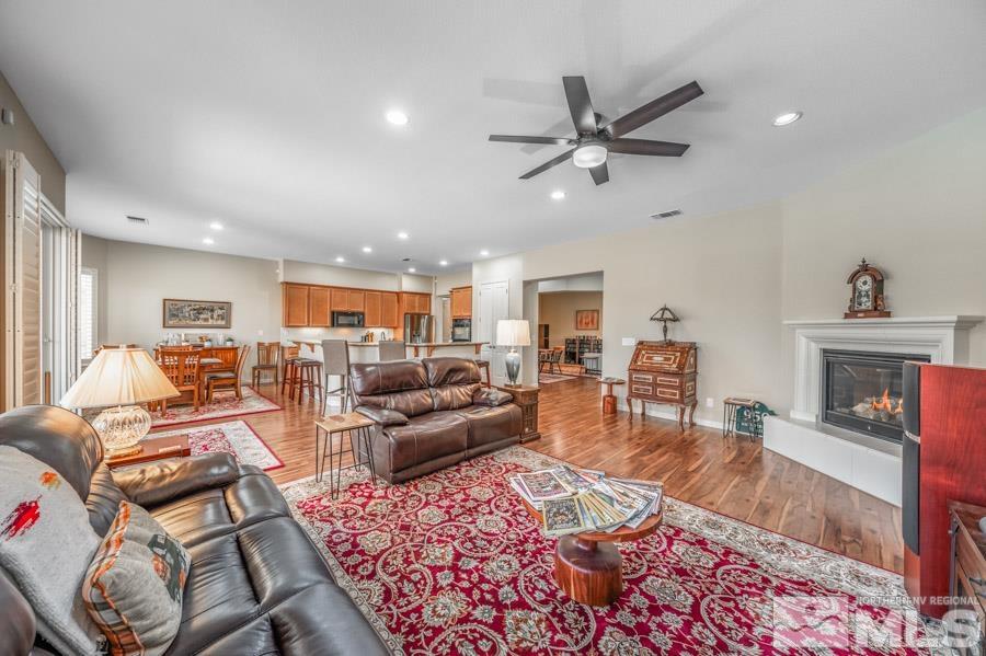 950 Broderick Trail Reno, NV 89523 - Photo 10 of 39 a living room with furniture and a fireplace