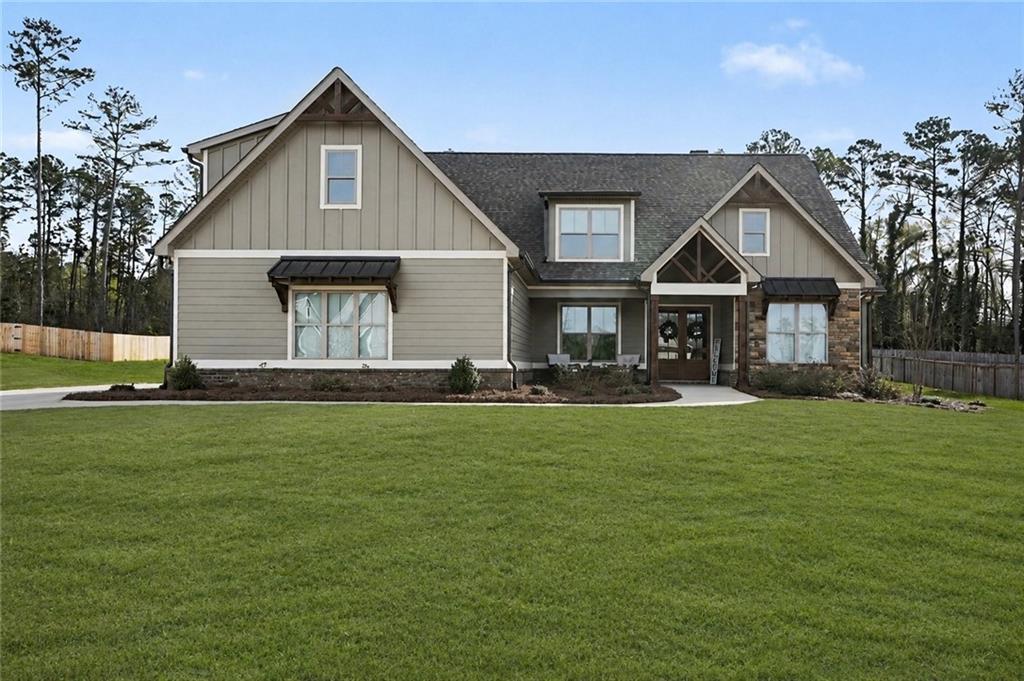 287 Conner Lane Williamson, GA 30292 - Photo 1 of 33 a front view of a house with a yard