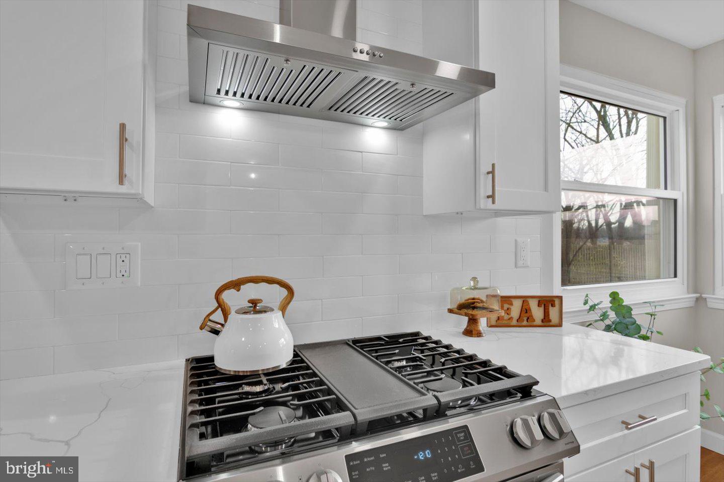 800 Marlowe Road Cherry Hill, NJ 08003 - Photo 24 of 55 a kitchen with a stove a window cabinets and a window