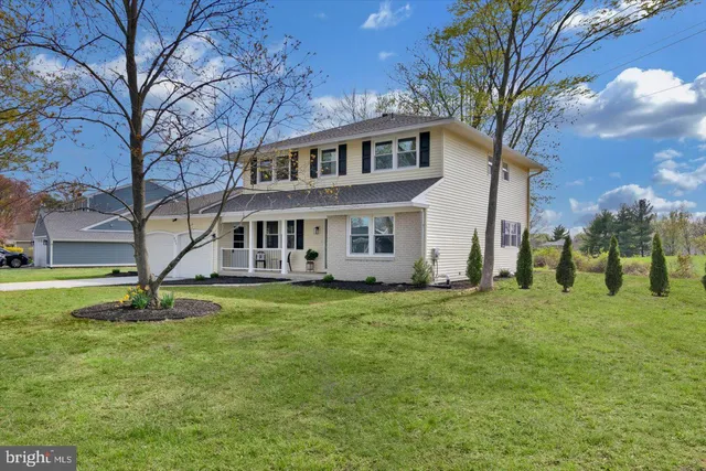 a view of a house with a big yard