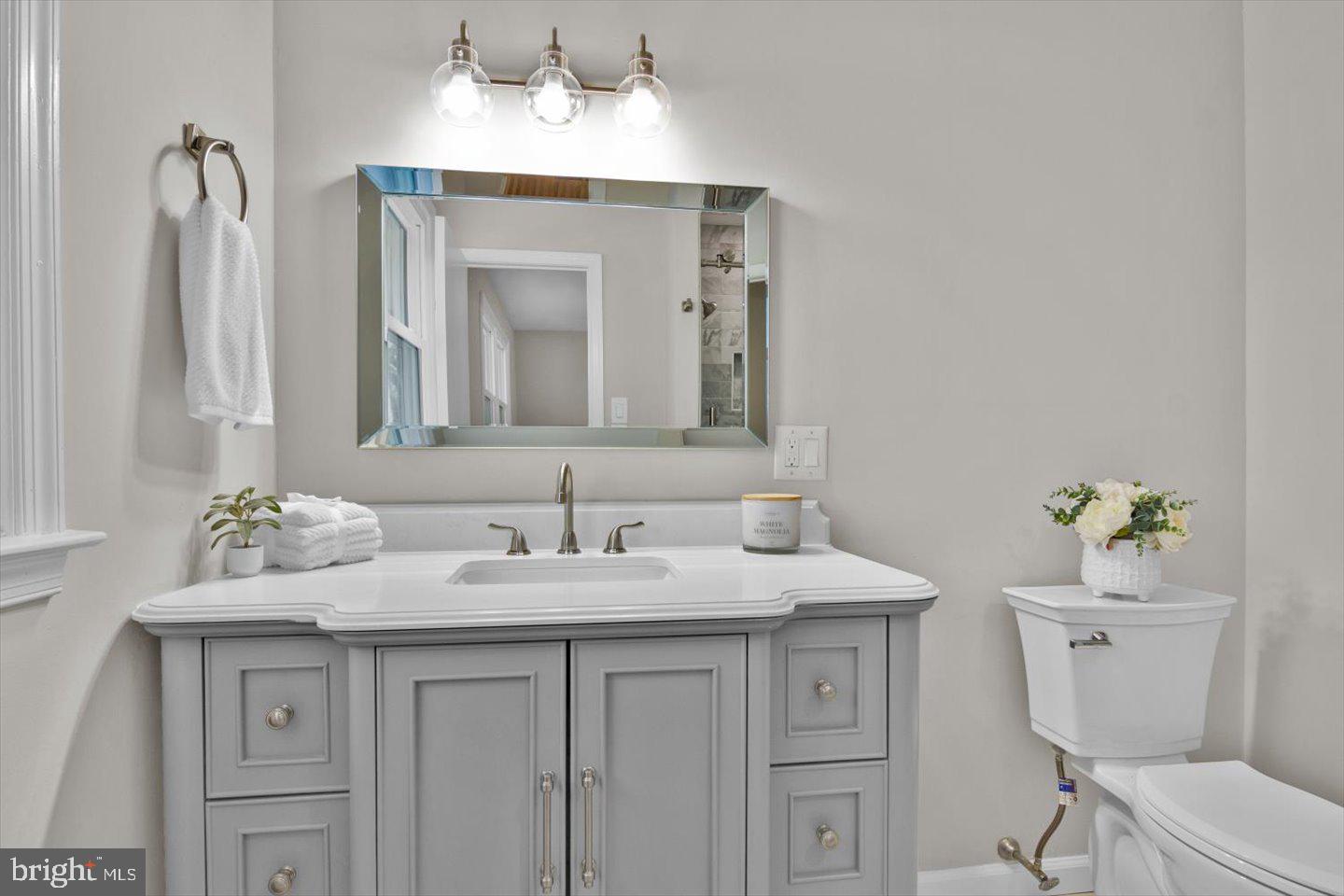 800 Marlowe Road Cherry Hill, NJ 08003 - Photo 31 of 55 a bathroom with a granite countertop sink and a toilet