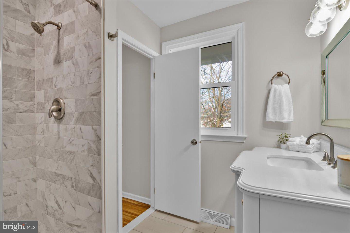 800 Marlowe Road Cherry Hill, NJ 08003 - Photo 32 of 55 a bathroom with a sink a vanity and a mirror